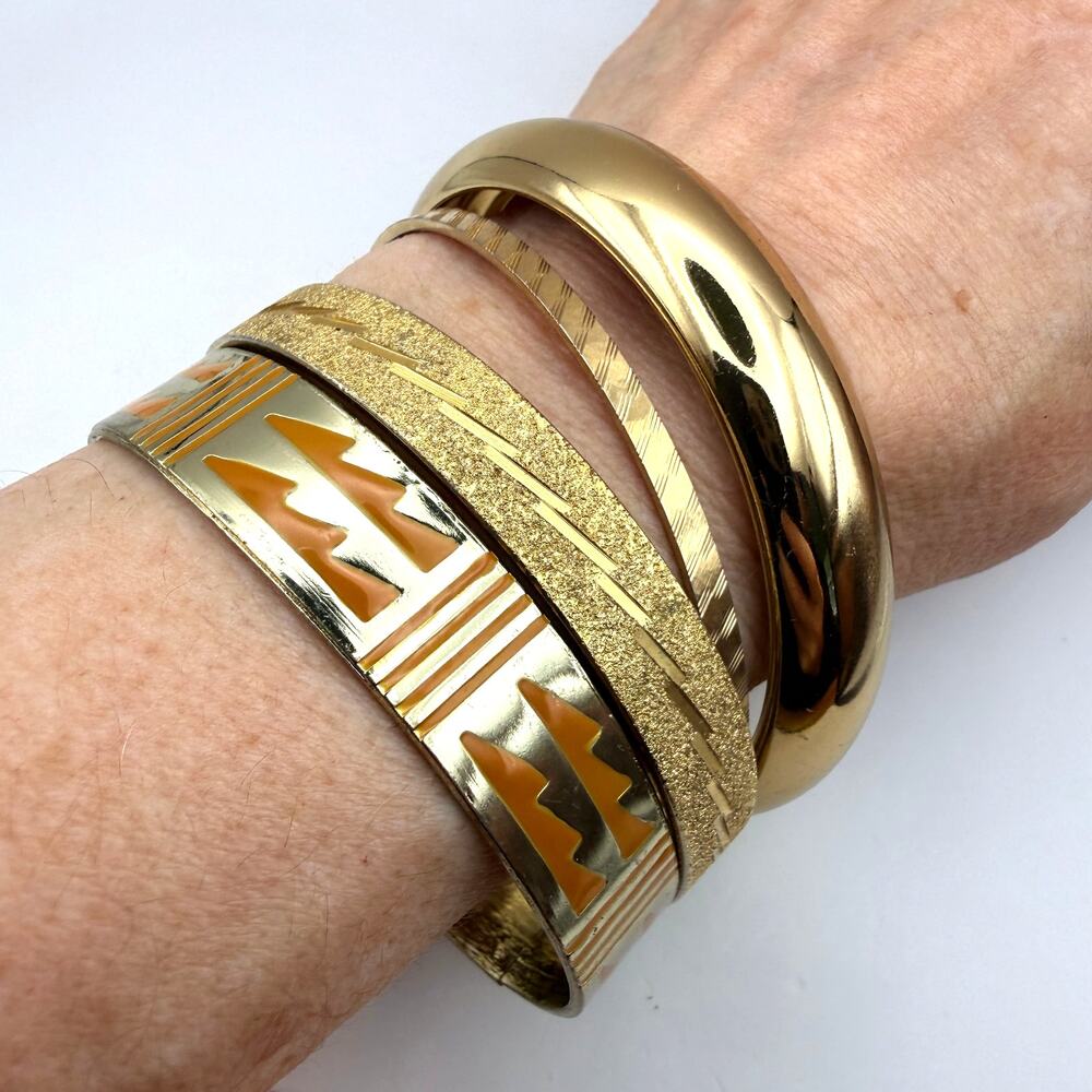 Lot 4 MCM Gold Tone Bangle Bracelet Set Etched Egyptian Revival Orange Enamel